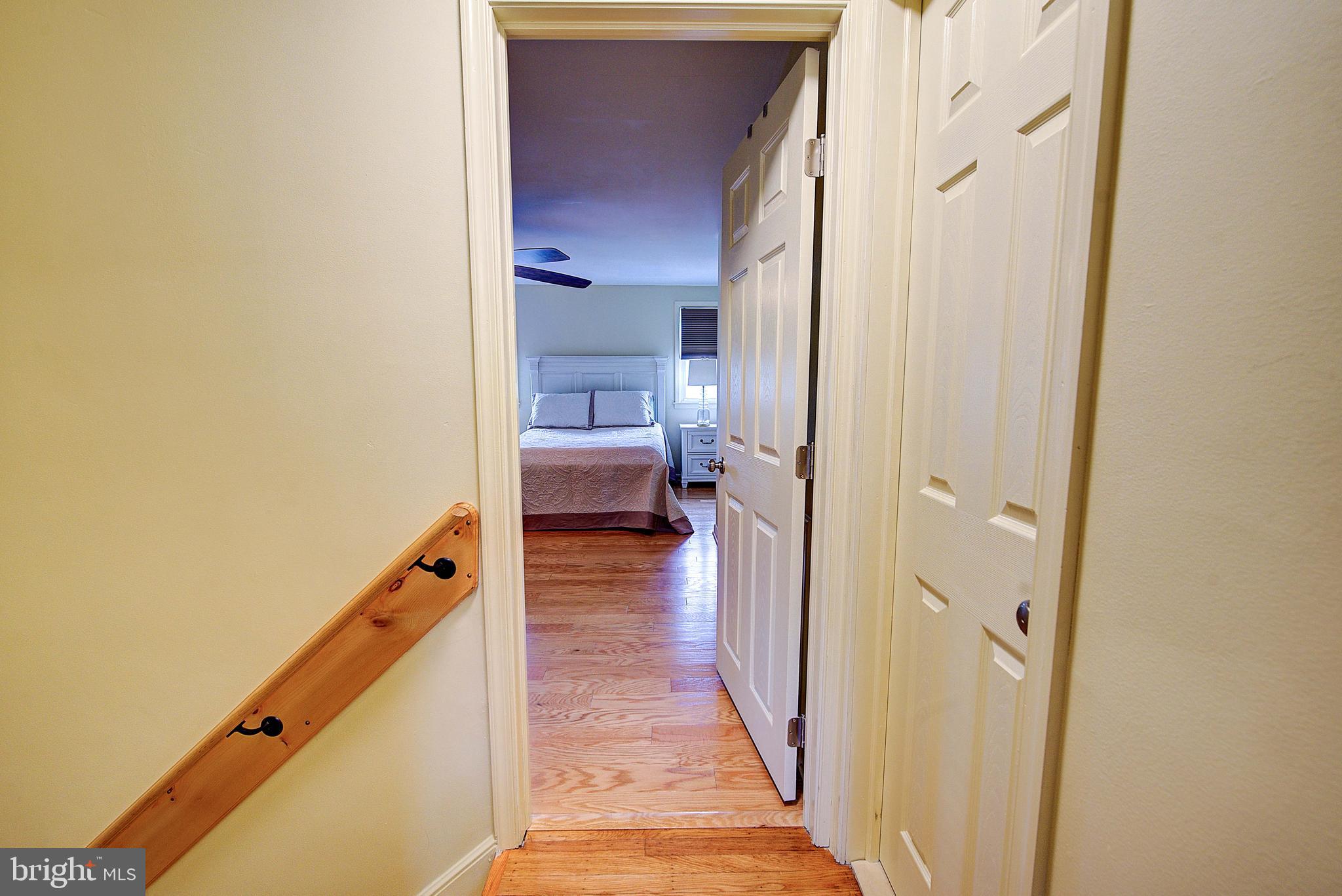 1367 Adair Road Brookhaven, PA 19015 - Photo 22 of 34 a view of a room that has a bed and a view of hallway