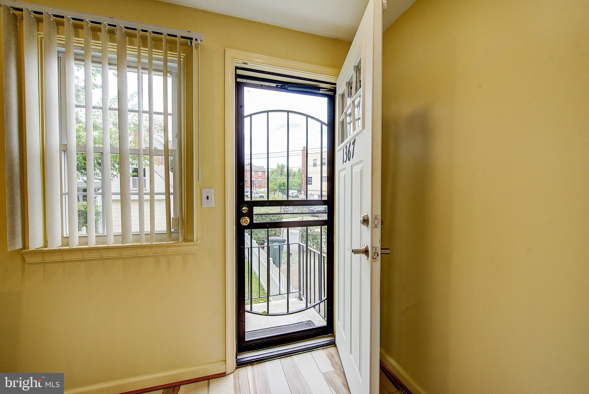 1367 Adair Road Brookhaven, PA 19015 - Photo 28 of 34 a view of a front door of a house