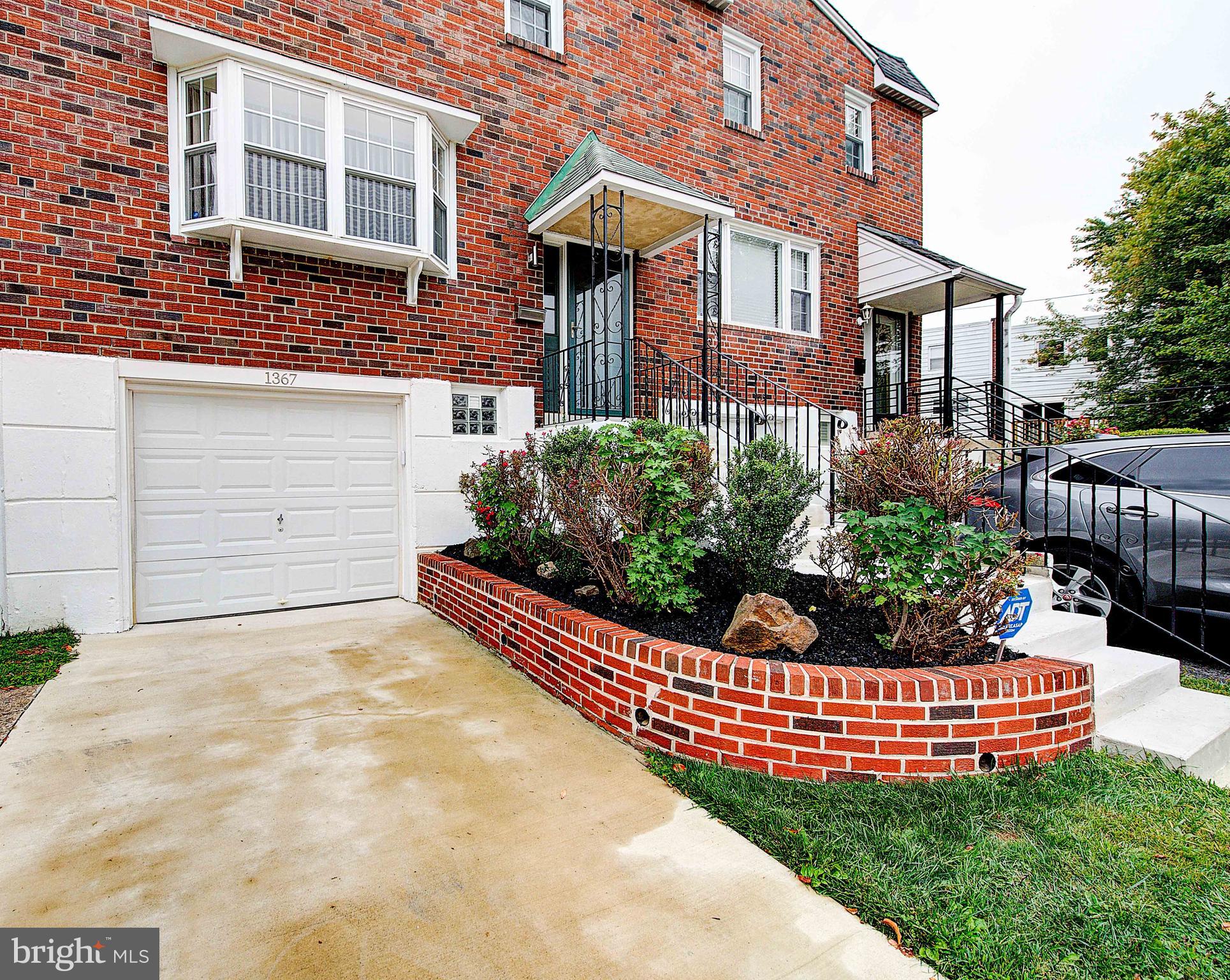 1367 Adair Road Brookhaven, PA 19015 - Photo 3 of 34 a view of a house with wooden fence