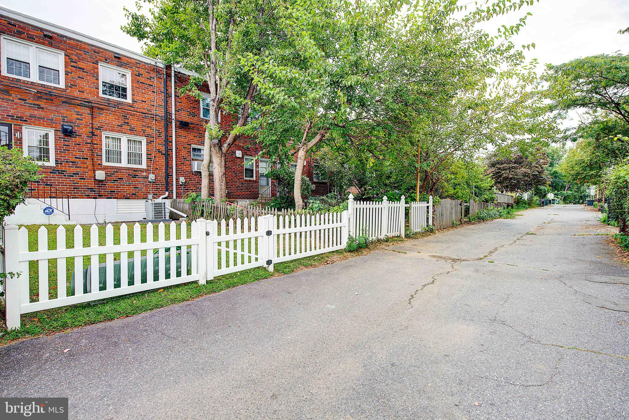 1367 Adair Road Brookhaven, PA 19015 - Photo 31 of 34 a view of a house with a wooden fence