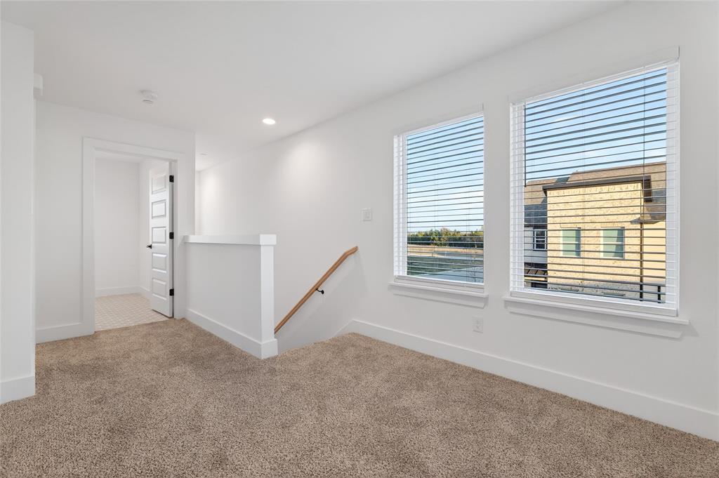 8901 Lowell Street Rowlett, TX 75089 - Photo 13 of 24 Empty room featuring carpet and recessed lighting