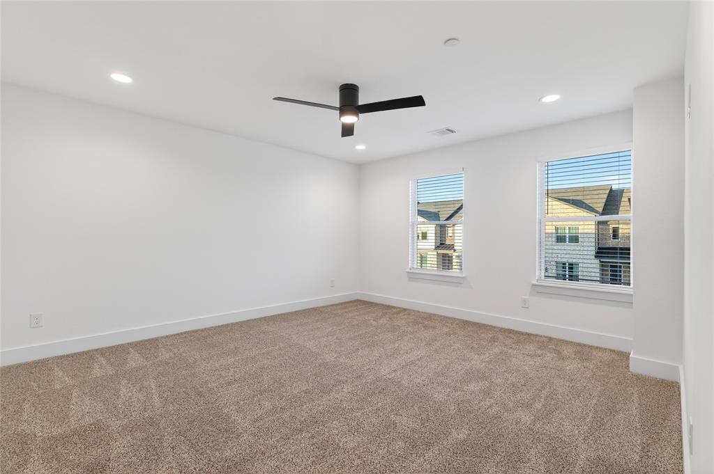 8901 Lowell Street Rowlett, TX 75089 - Photo 20 of 24 Carpeted spare room with recessed lighting and ceiling fan