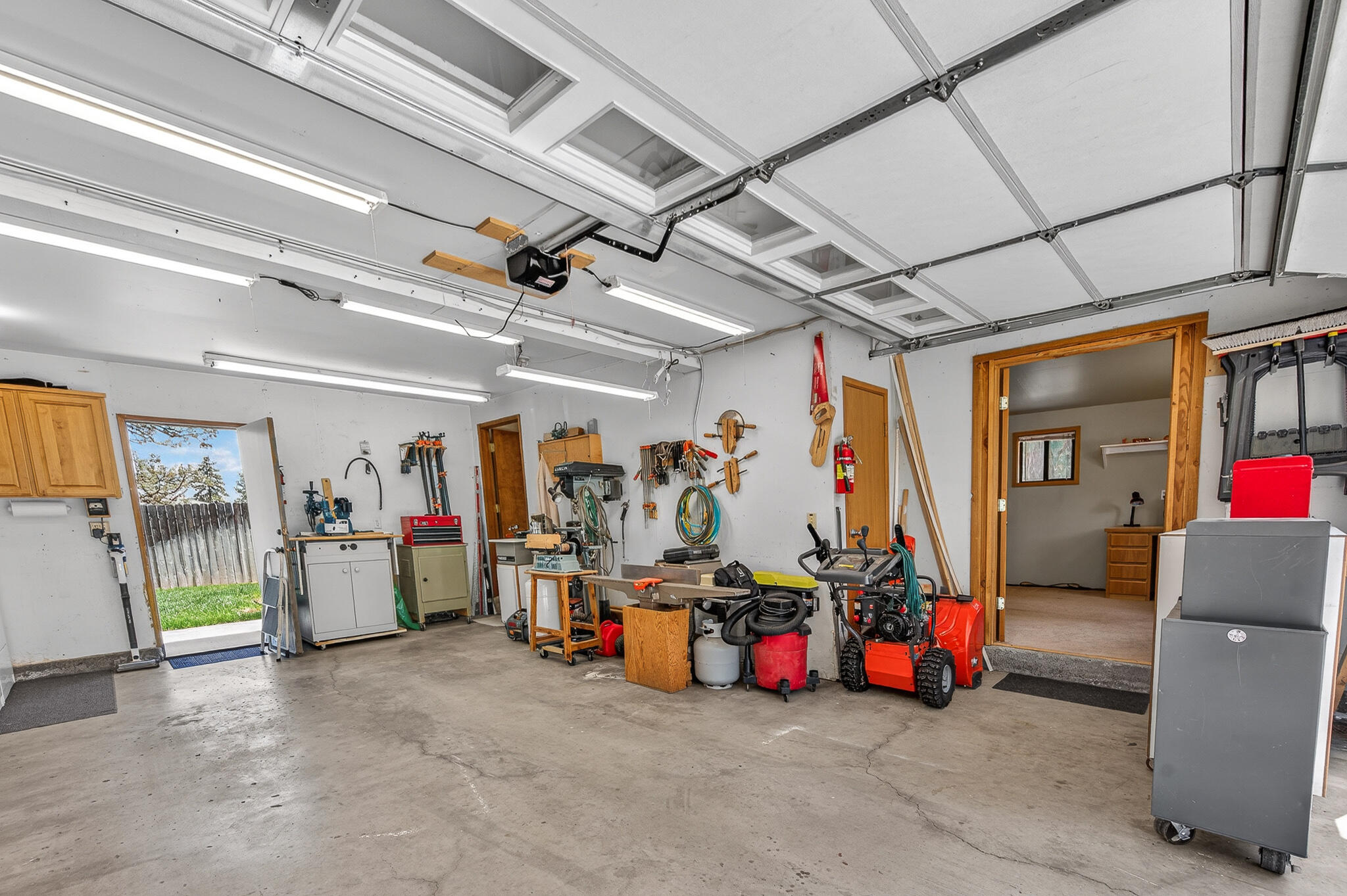 60866 Brosterhous Road Bend, OR 97702 - Photo 28 of 41 a view of a storage room with furniture and storage