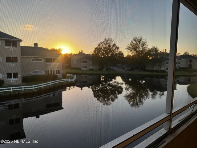 a front view of a house with lake view