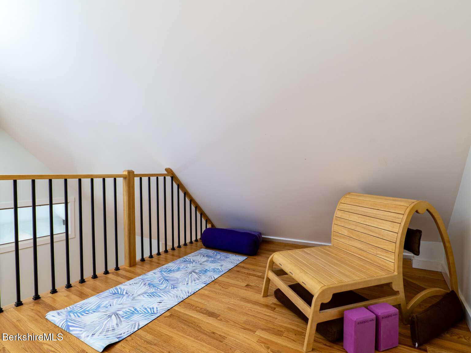 160 High Street Lee, MA 01238 - Photo 37 of 41 a bedroom with a bed and wooden floor