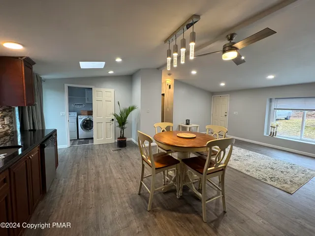 a bathroom with a sink and mirror