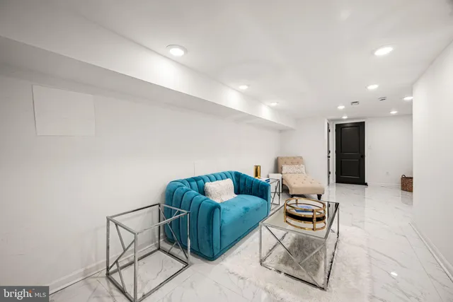 a living room with furniture and a couch