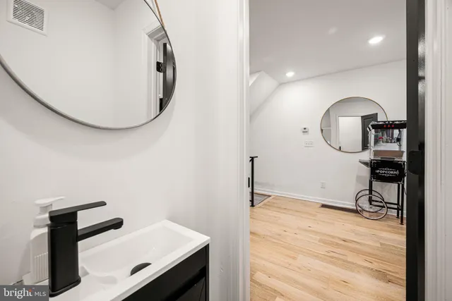 a view of a livingroom with wooden floor