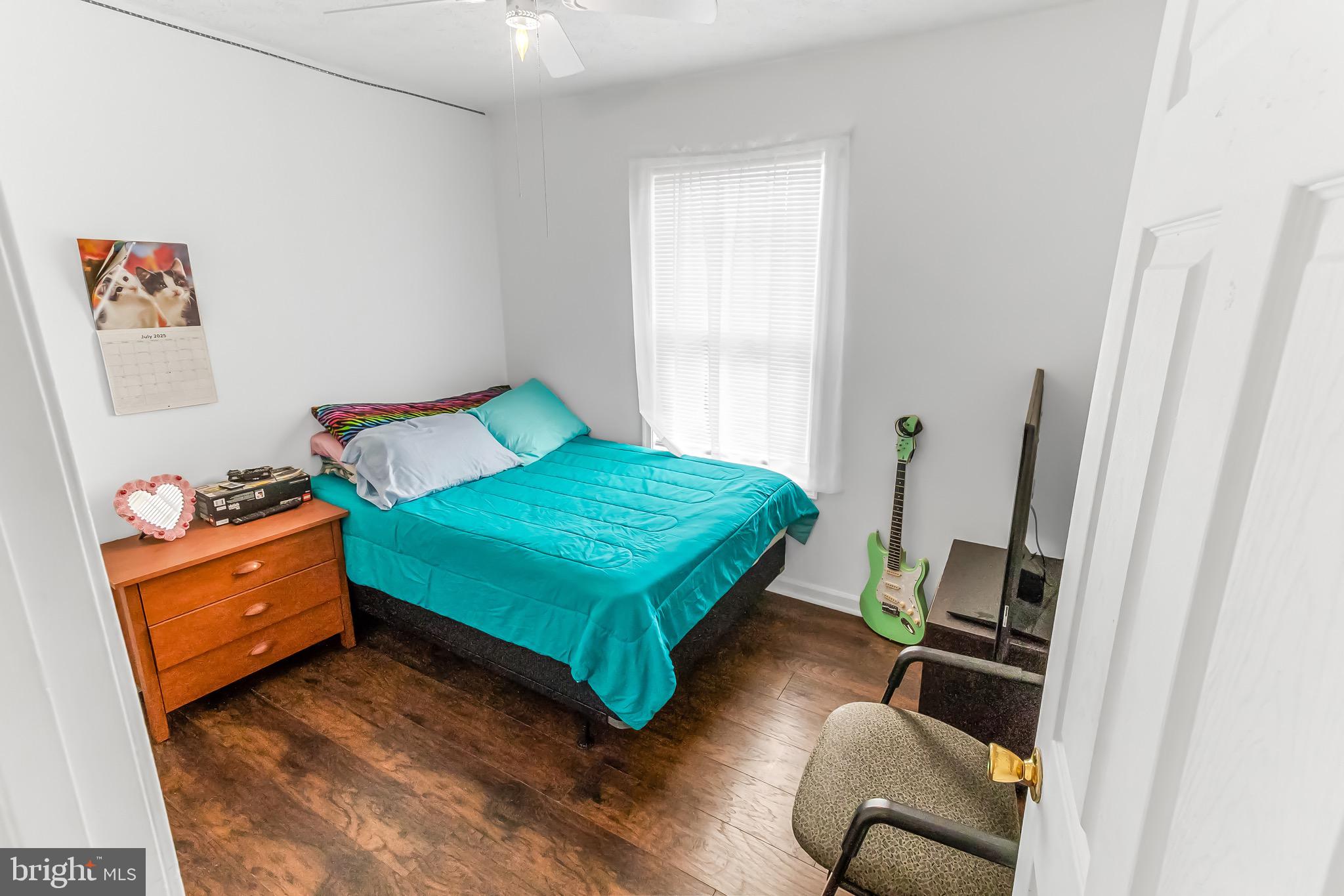 207 Preston Place Ranson, WV 25438 - Photo 15 of 32 a room with a bed and a window
