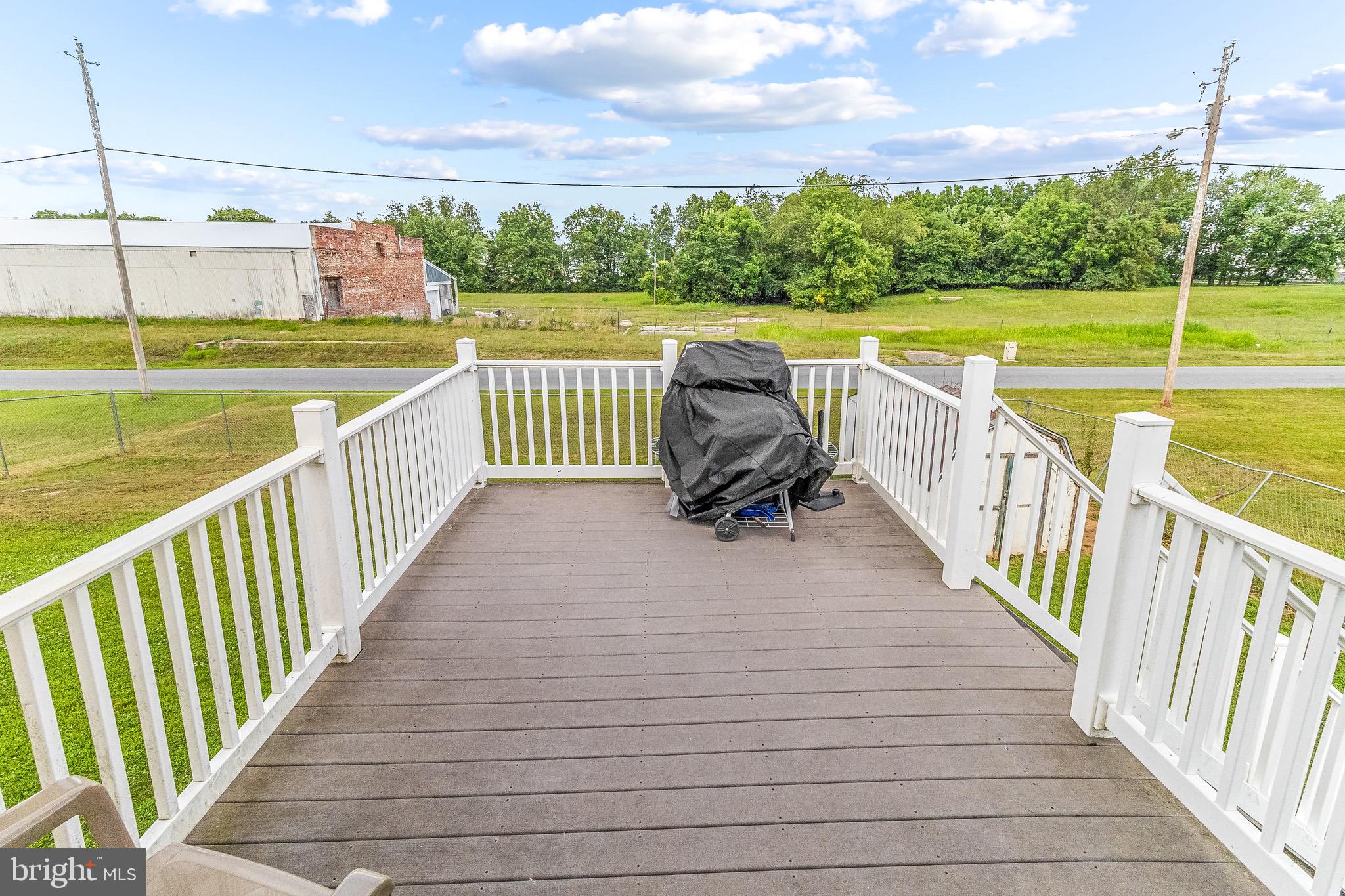 207 Preston Place Ranson, WV 25438 - Photo 24 of 32 a view of a two chairs on the roof deck