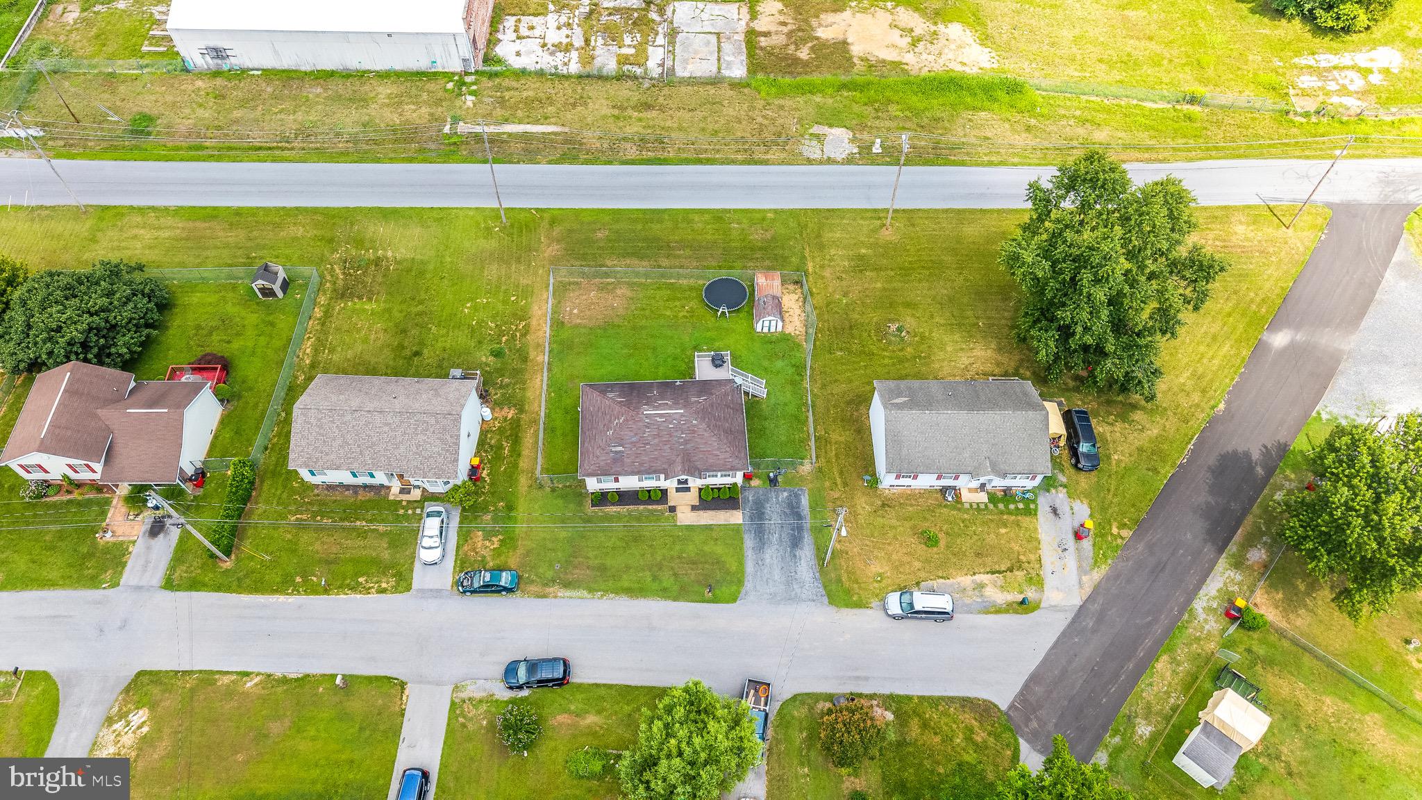 207 Preston Place Ranson, WV 25438 - Photo 29 of 32 an aerial view of residential houses with outdoor space and swimming pool
