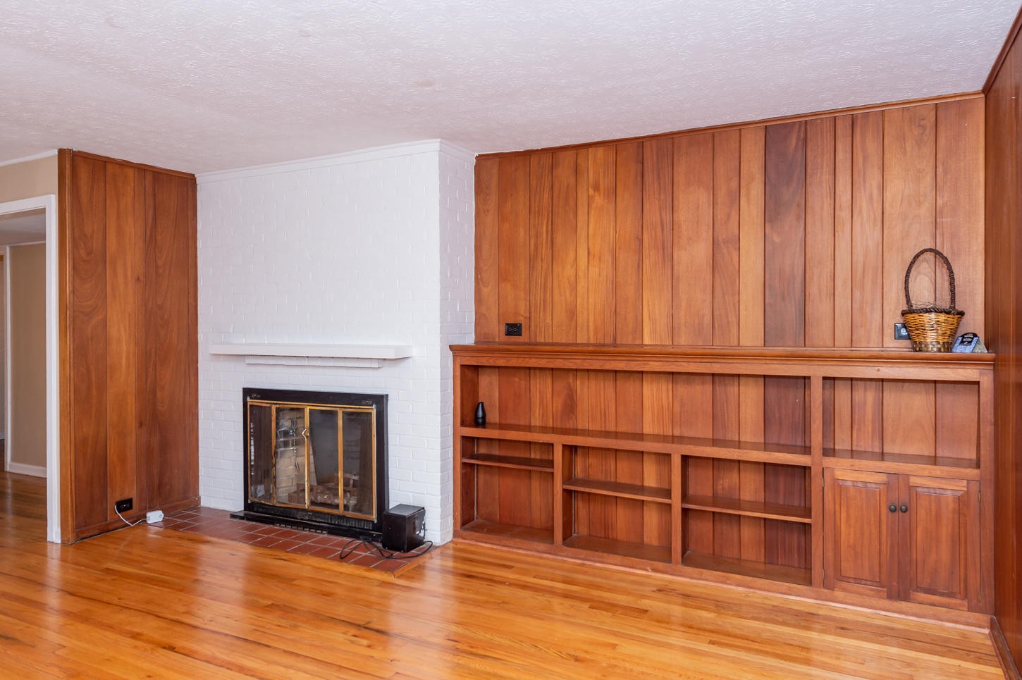 122 Euclid Circle Oak Ridge, TN 37830 - Photo 7 of 20 a view of an empty room with wooden floor and a window