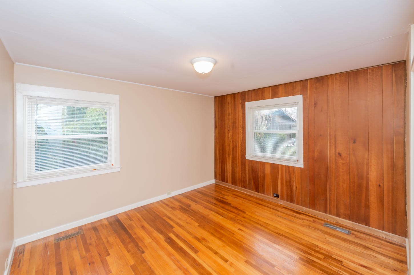 122 Euclid Circle Oak Ridge, TN 37830 - Photo 9 of 20 a view of an empty room with wooden floor and a window