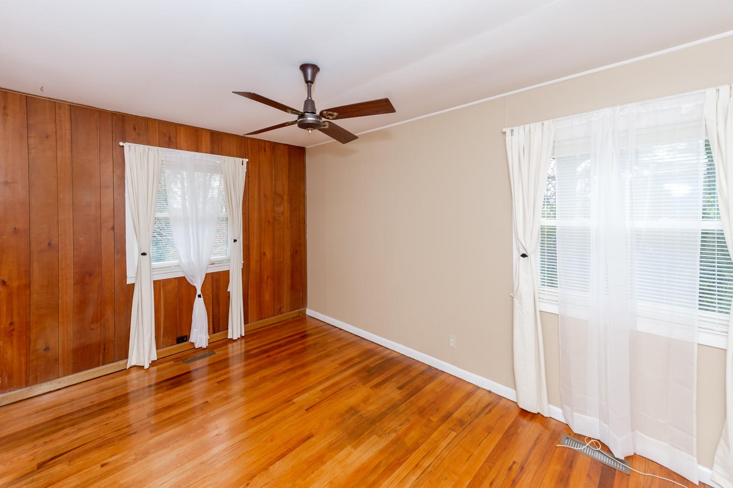 122 Euclid Circle Oak Ridge, TN 37830 - Photo 10 of 20 a view of an empty room with wooden floor and a window
