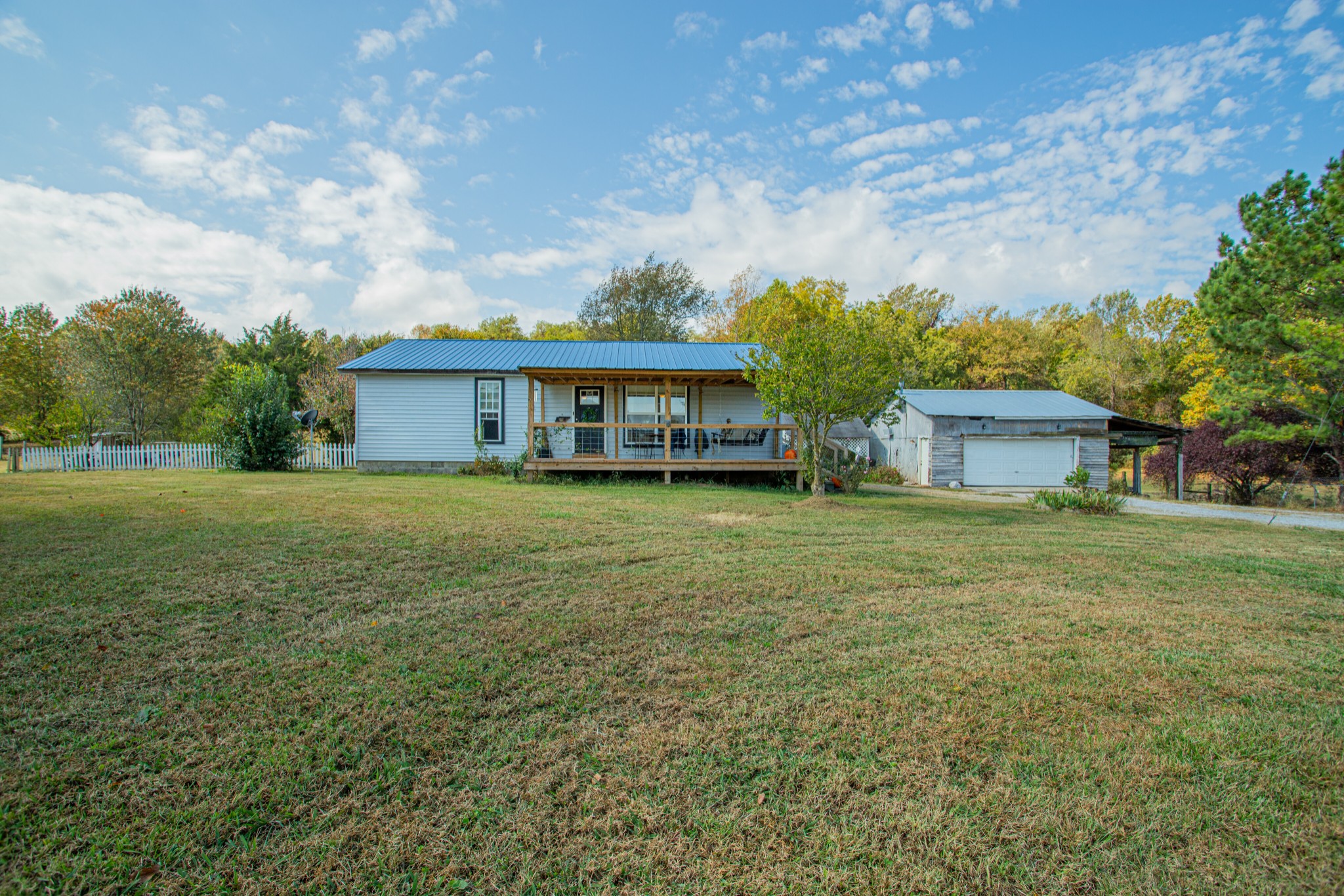 1394 Harpo Road Manchester, TN 37355 - Photo 1 of 32 a view of a house with a yard