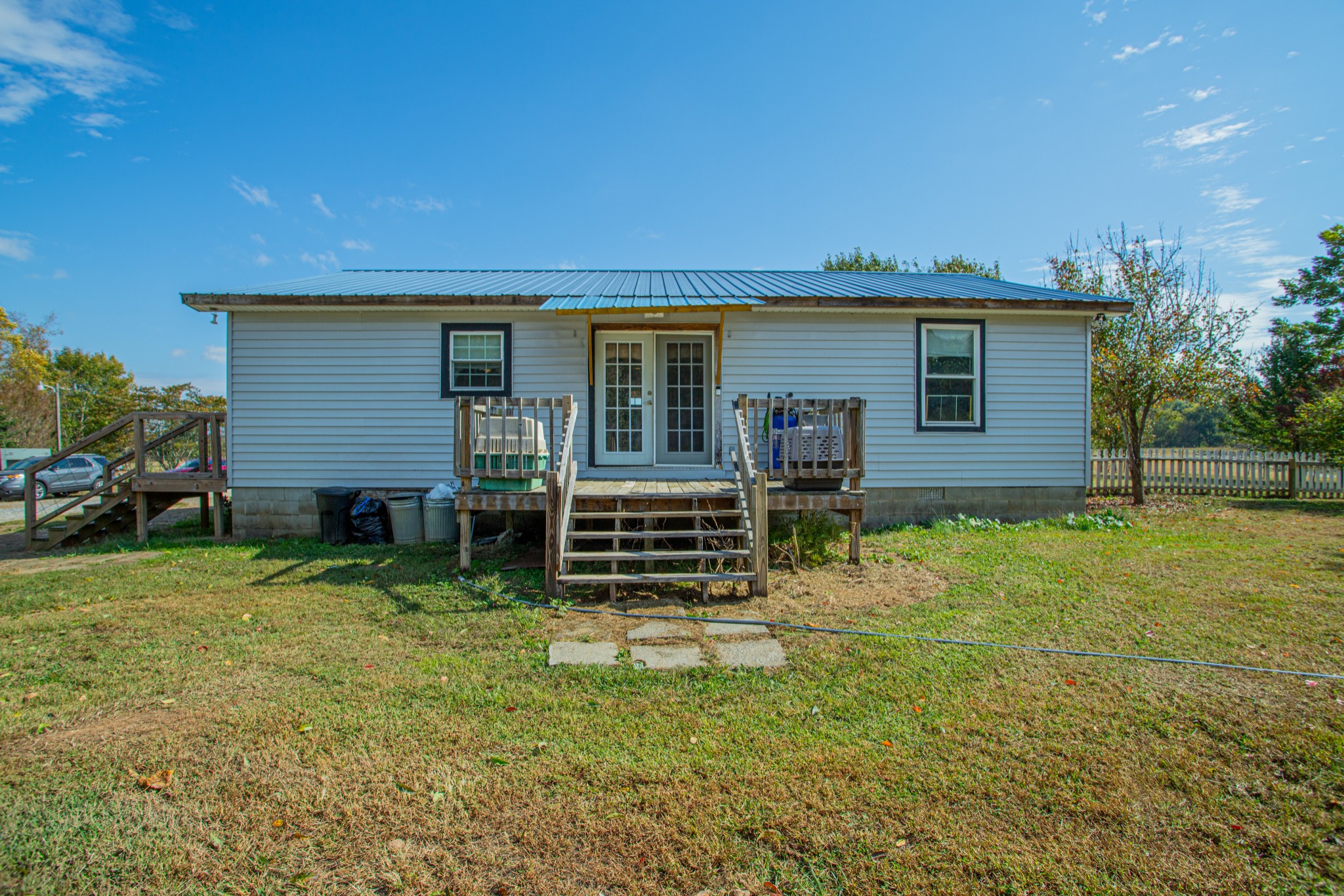 1394 Harpo Road Manchester, TN 37355 - Photo 24 of 32 a front view of a house with garden