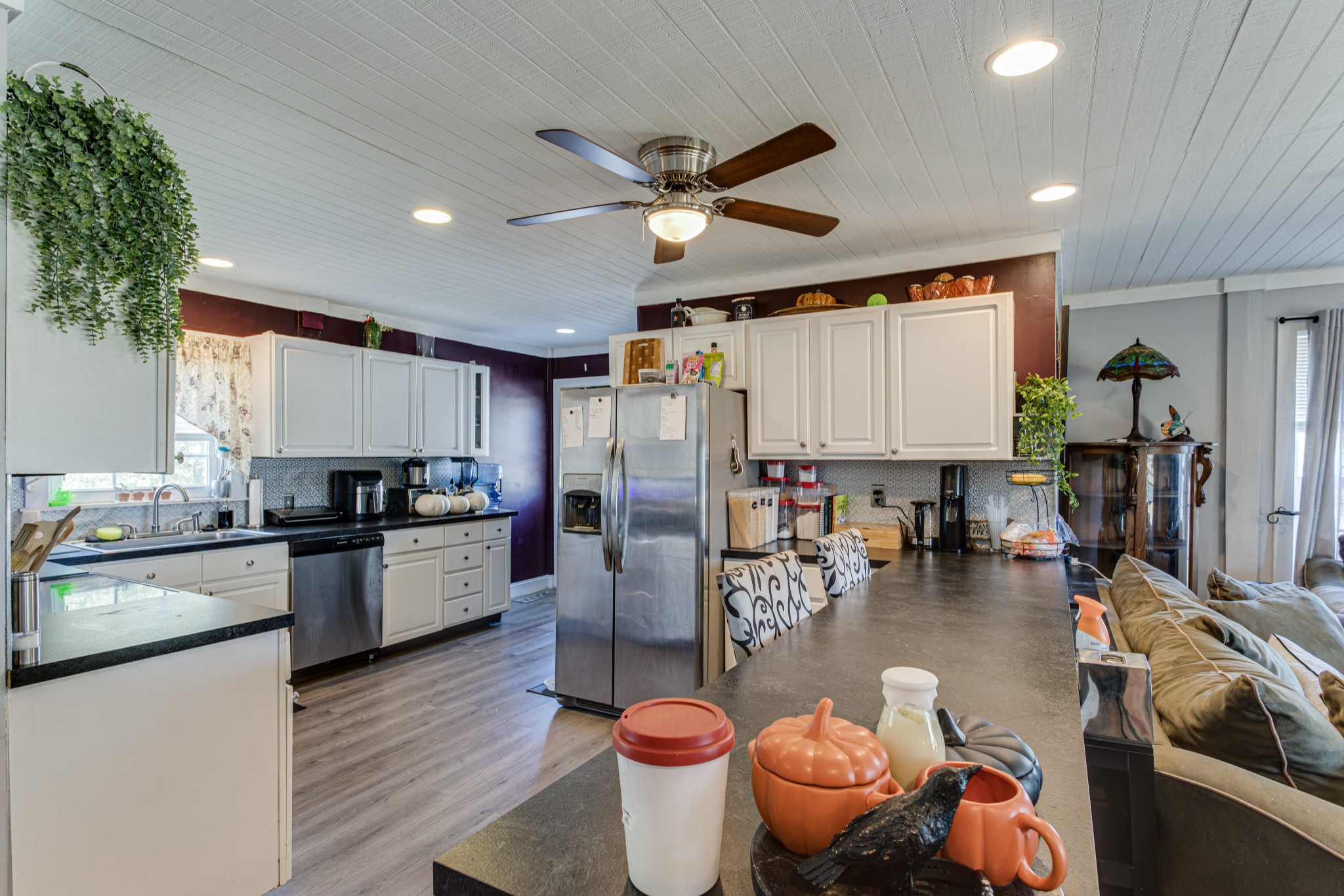 1394 Harpo Road Manchester, TN 37355 - Photo 9 of 32 a kitchen with stainless steel appliances granite countertop a sink a stove and a refrigerator