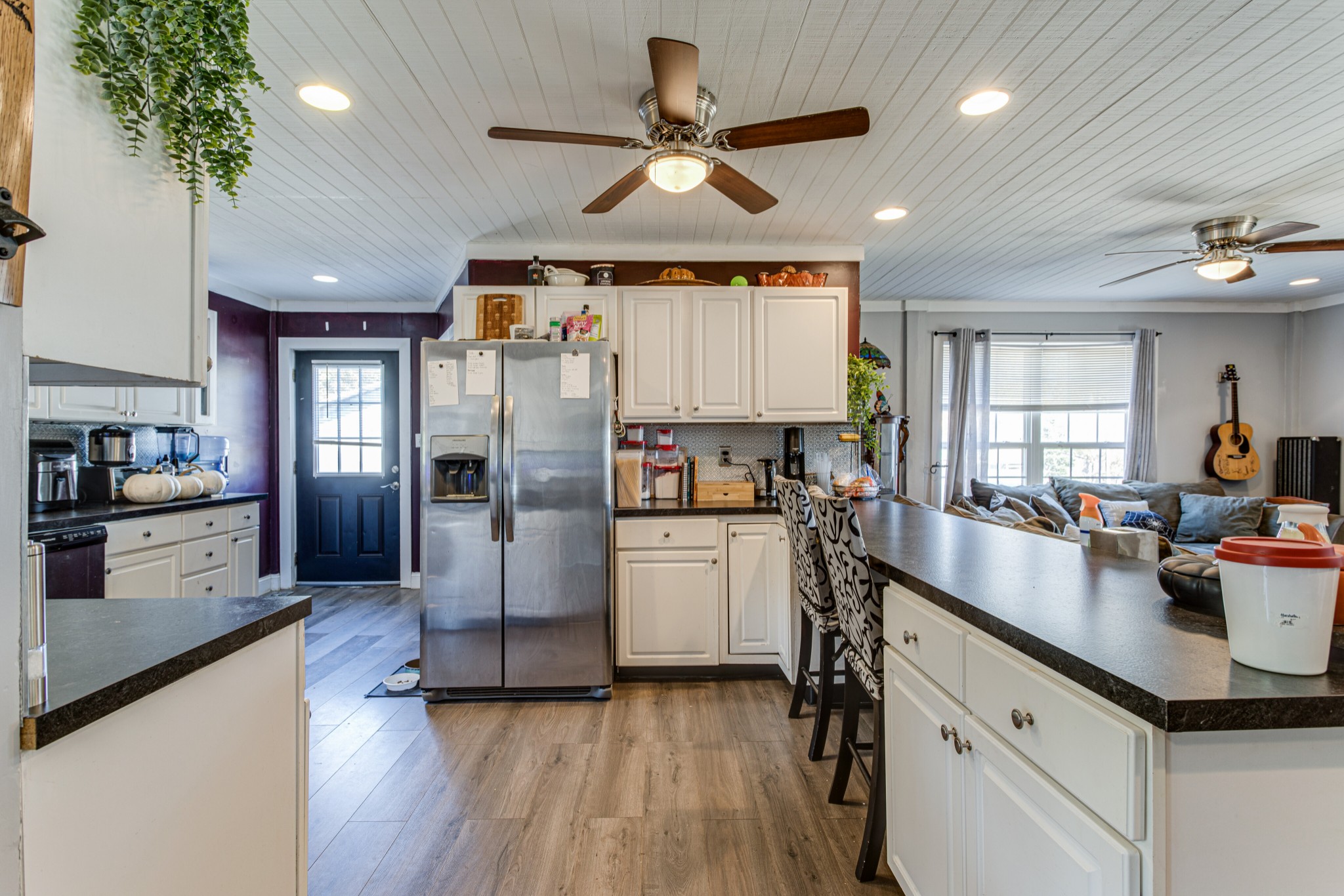 1394 Harpo Road Manchester, TN 37355 - Photo 10 of 32 a kitchen with sink cabinets and wooden floor