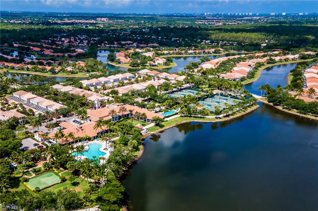 4167 St George Lane Naples, FL 34119 - Photo 12 of 14 an aerial view of residential houses with outdoor space and river
