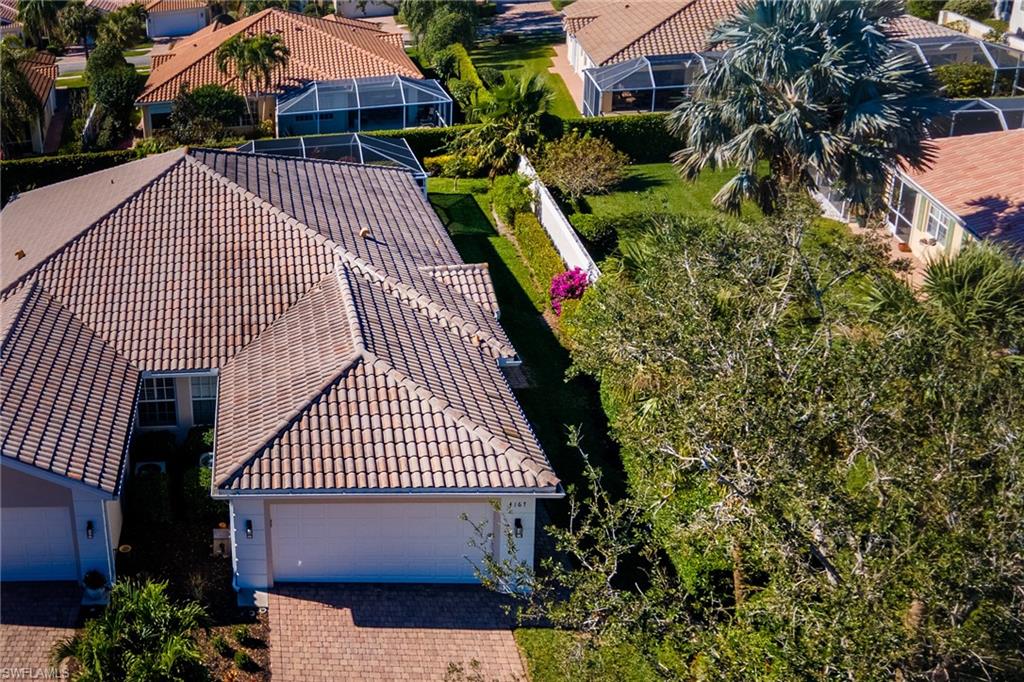 4167 St George Lane Naples, FL 34119 - Photo 14 of 14 an outdoor space with lots of trees