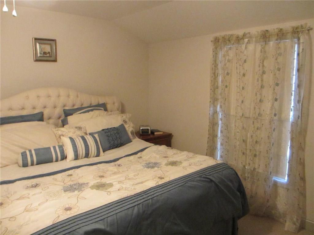 98 Harvest Hill Road Windham, ME 04062 - Photo 23 of 27 Large master bedroom over the garage...