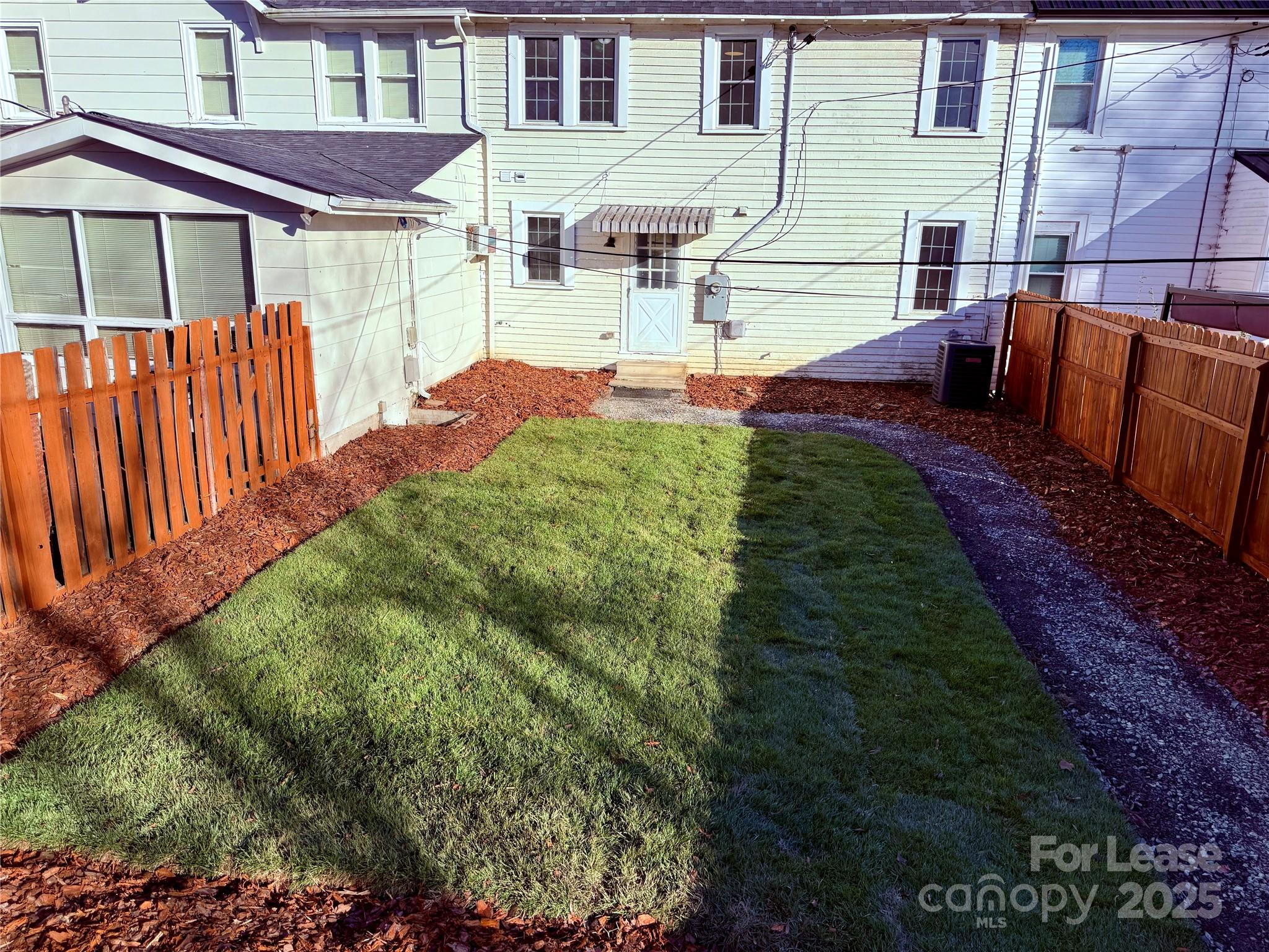 130 Maple Street Badin, NC 28009 - Photo 23 of 24 a aerial view of a house with garden