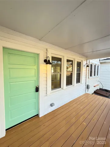 a view of house with backyard