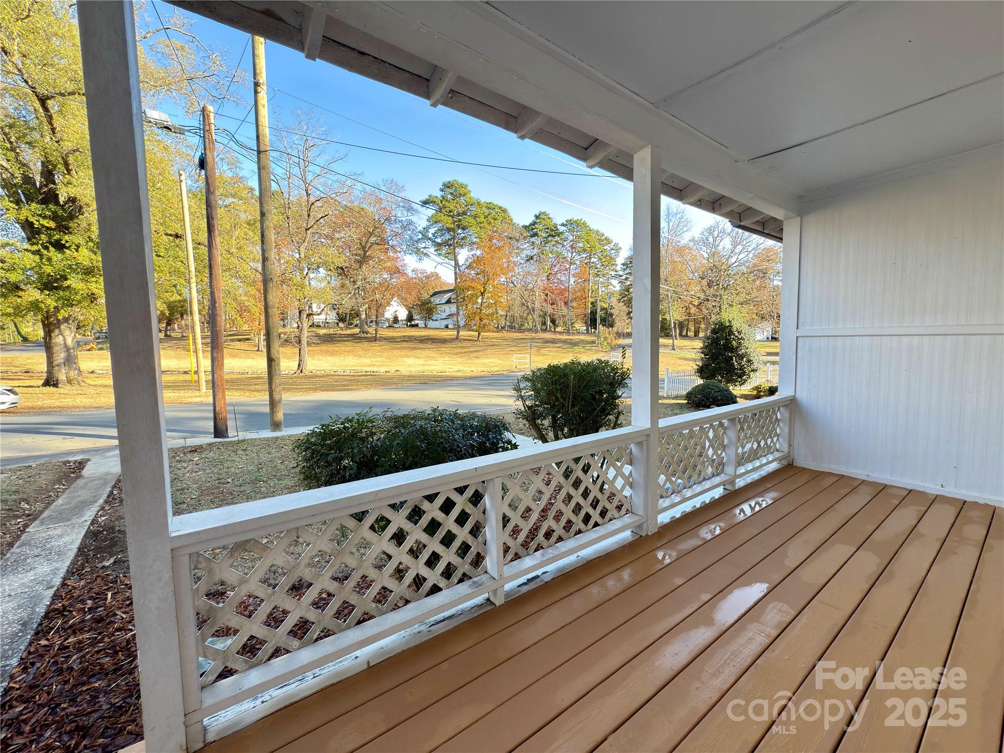 130 Maple Street Badin, NC 28009 - Photo 5 of 24 a view of a balcony with wooden floor