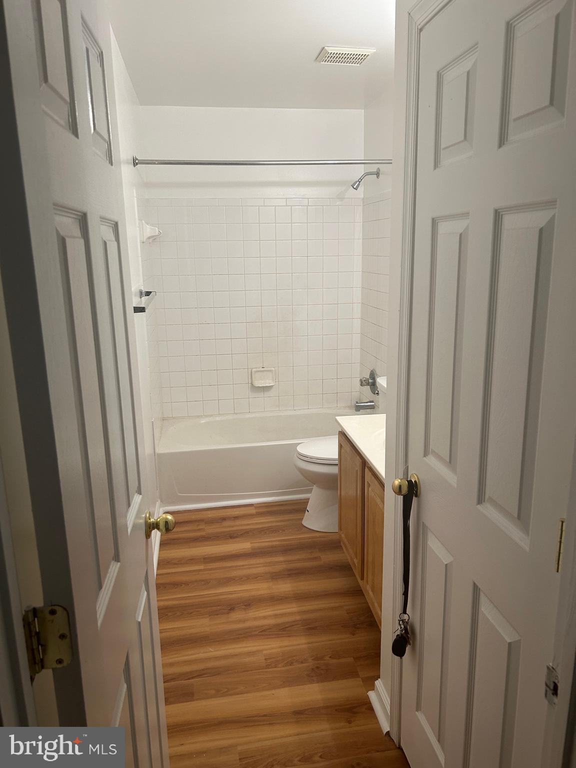 10109 Tulip Tree Drive Bowie, MD 20721 - Photo 4 of 8 a bathroom with a sink and a shower
