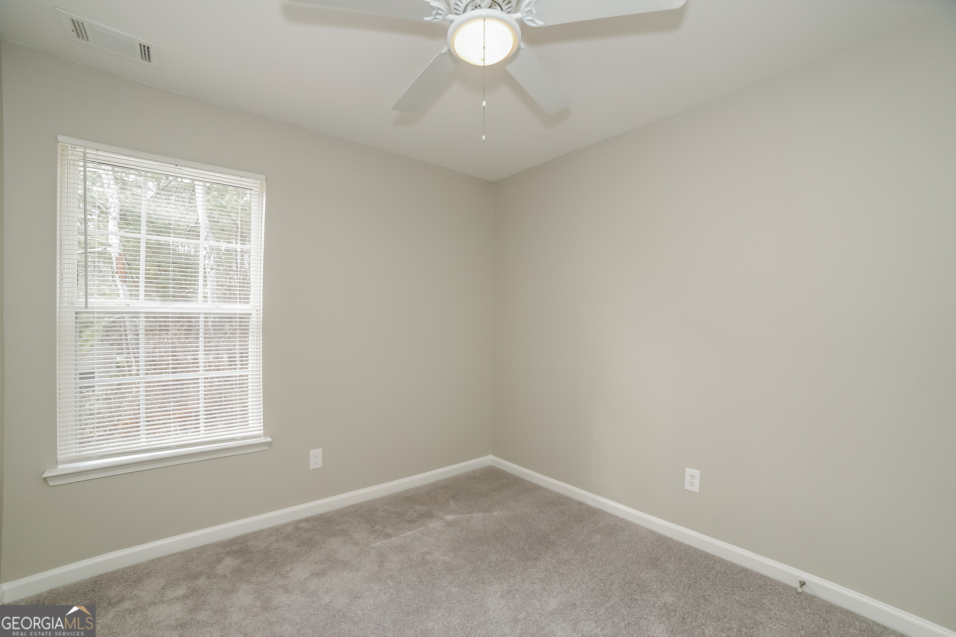 7111 Brookview Way Riverdale, GA 30274 - Photo 14 of 17 an empty room with window