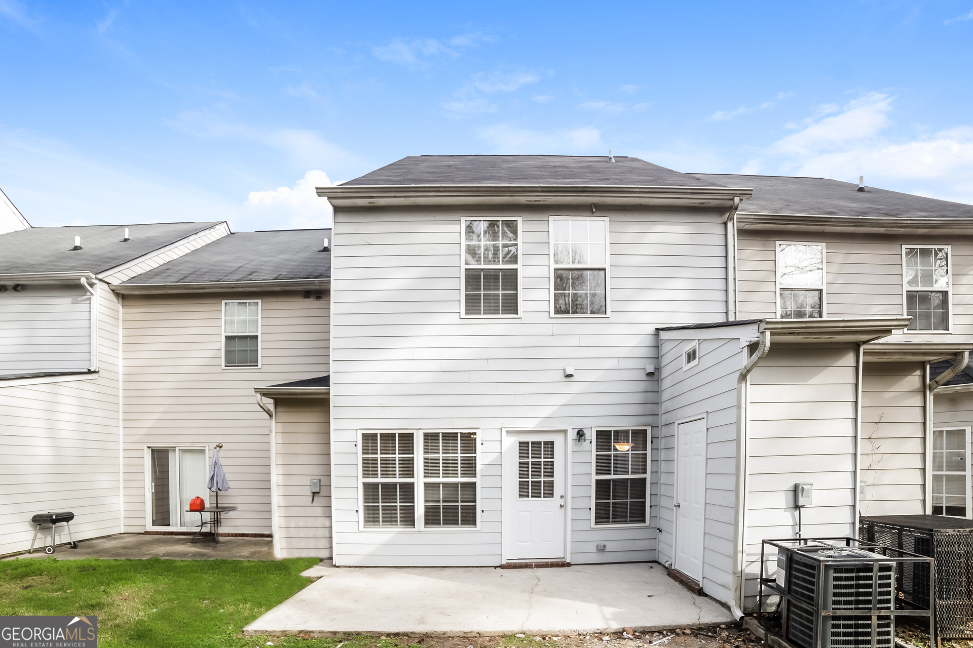 7111 Brookview Way Riverdale, GA 30274 - Photo 17 of 17 a front view of a house with a garden