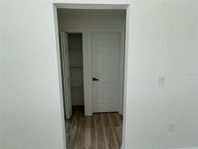 a view of a livingroom from a hallway