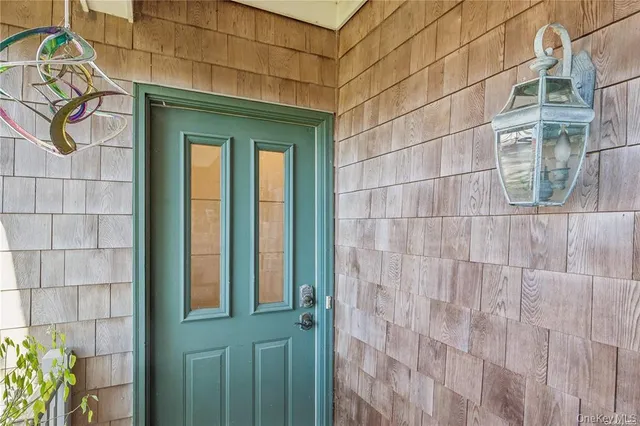 a bathroom with a shower and a sink