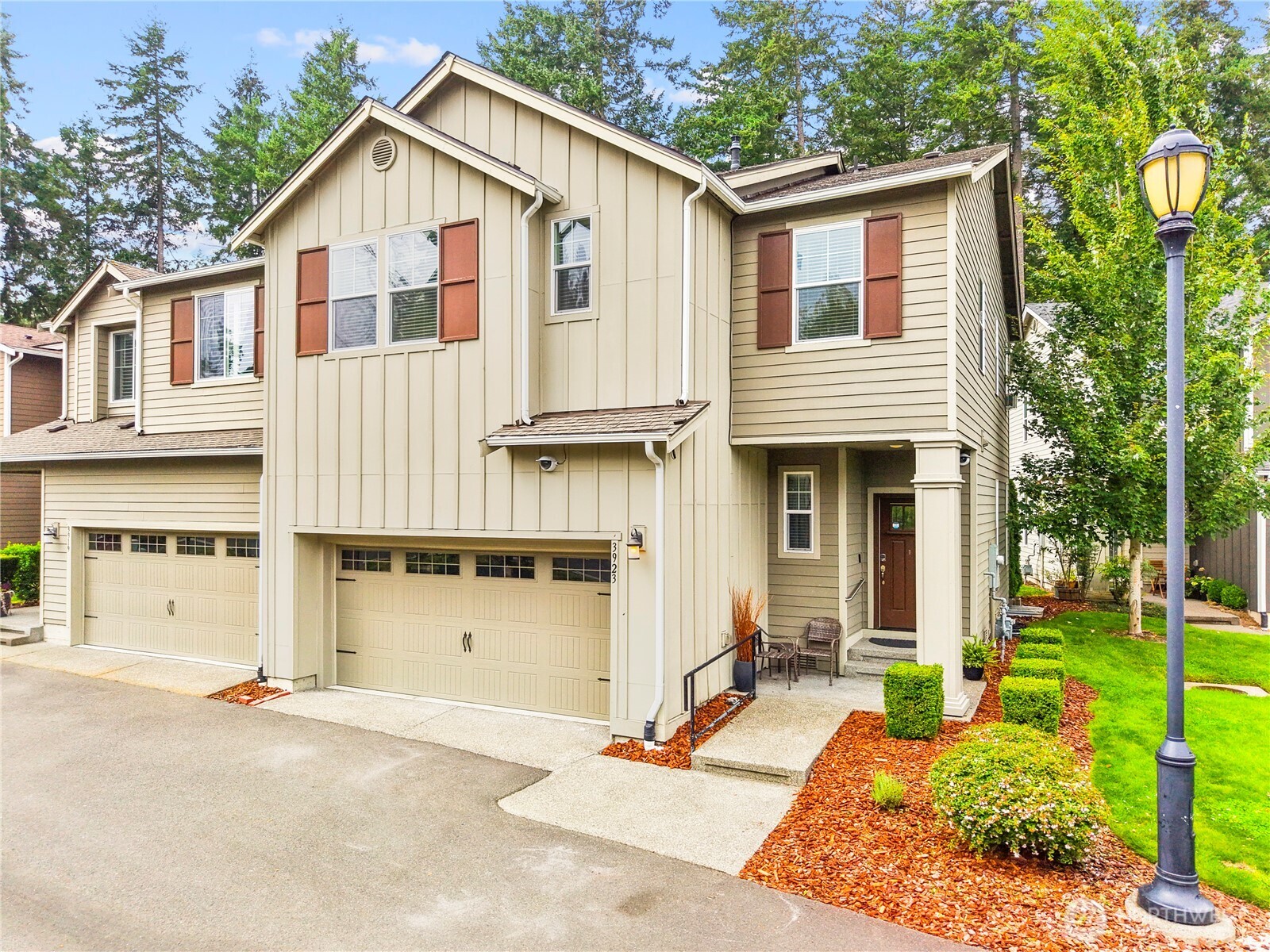 3923 Jett Lane Lacey, WA 98516 - Photo 2 of 40 a front view of a house with garden
