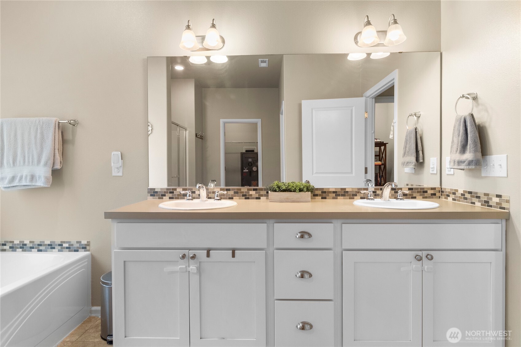 3923 Jett Lane Lacey, WA 98516 - Photo 21 of 40 a bathroom with a sink vanity and mirror