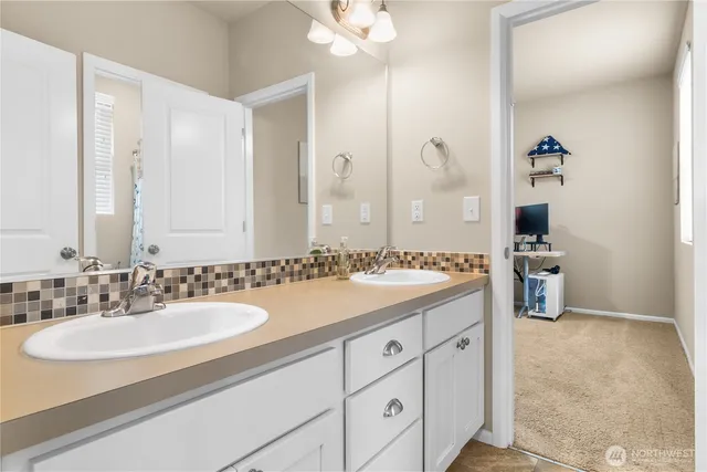 a bathroom with a sink double vanity