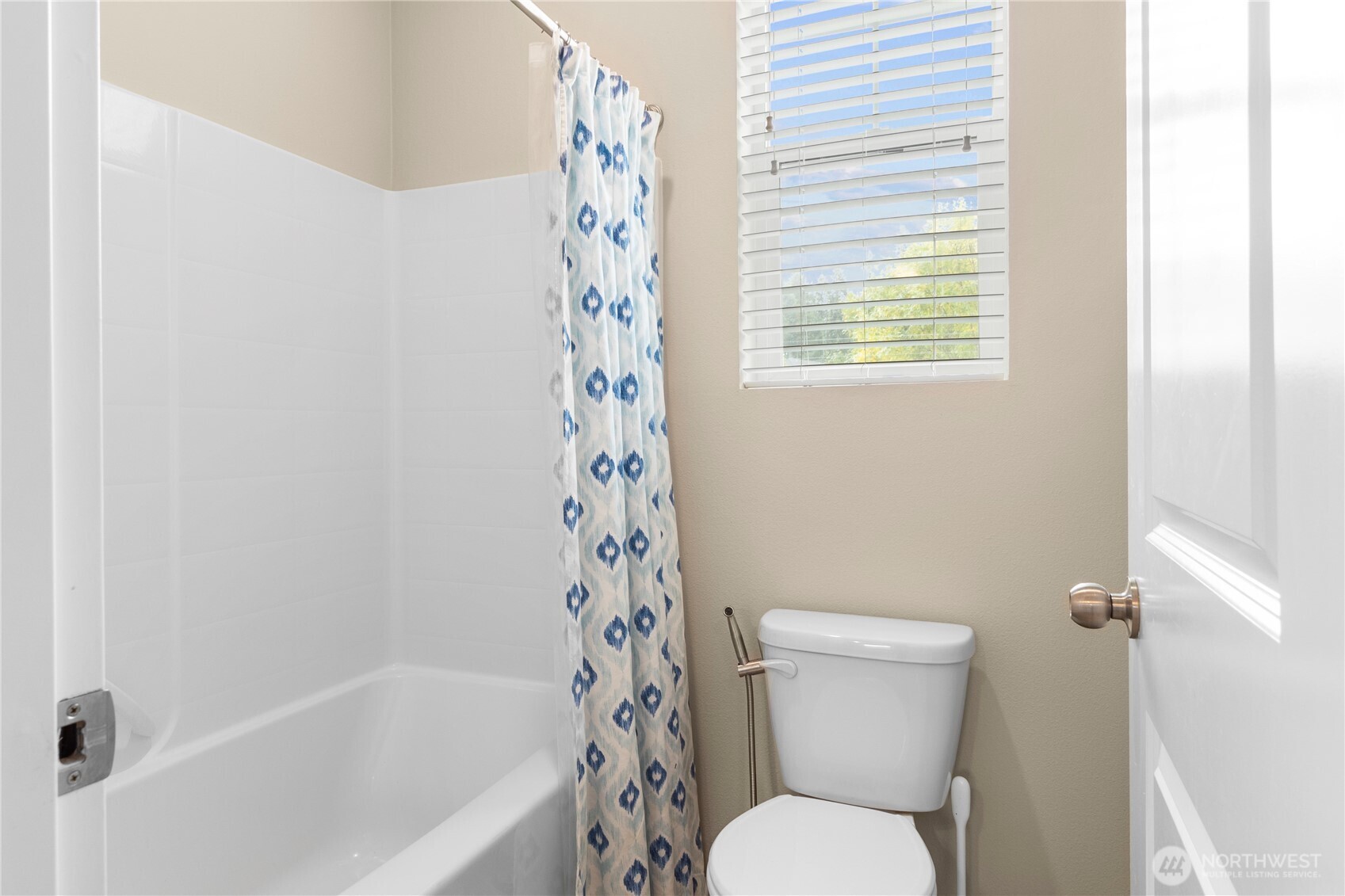 3923 Jett Lane Lacey, WA 98516 - Photo 27 of 40 a white toilet sitting next to a bath tub