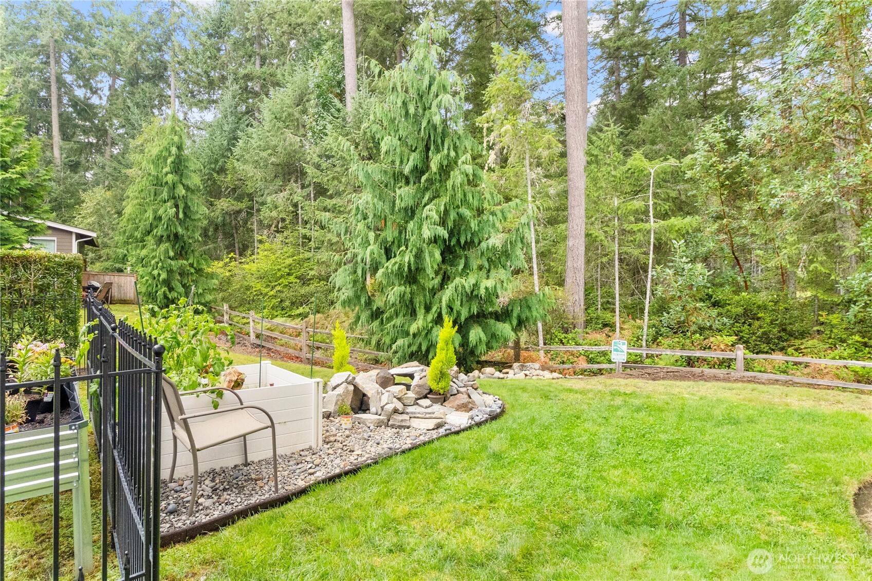 3923 Jett Lane Lacey, WA 98516 - Photo 36 of 40 a view of a backyard with sitting area