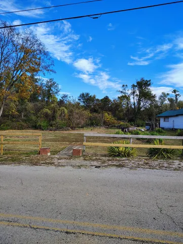 a view of a lake with a houses