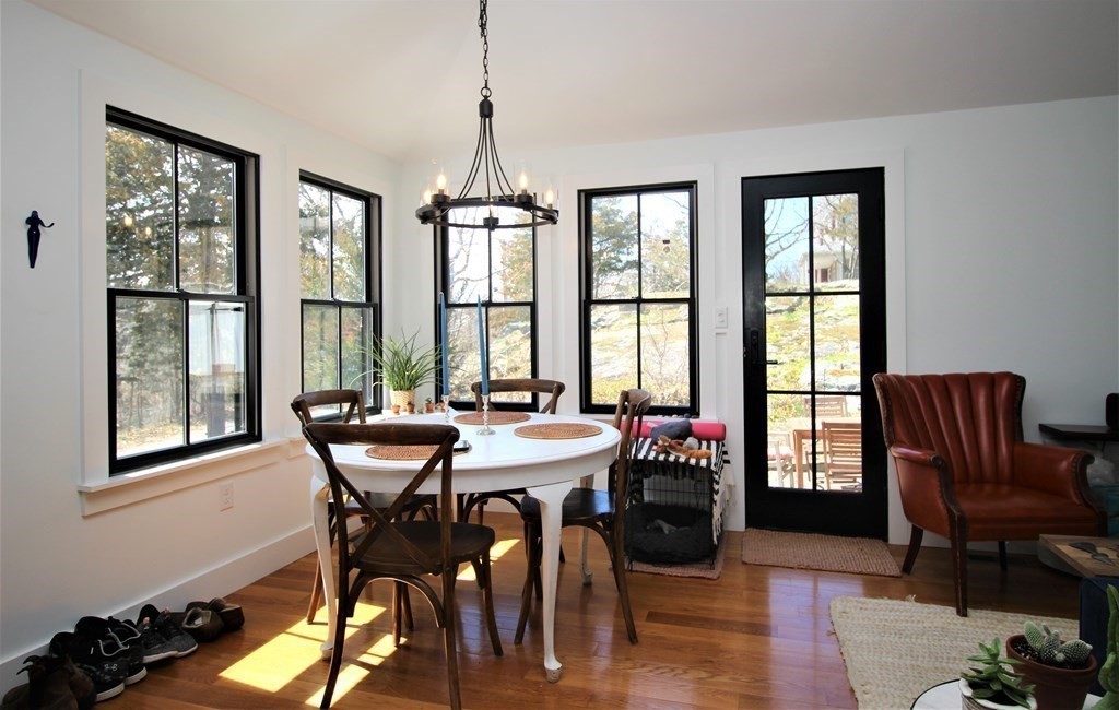 26 Delewanda Road Hull, MA 02045 - Photo 3 of 10 a view of a dining room with furniture window and outside view
