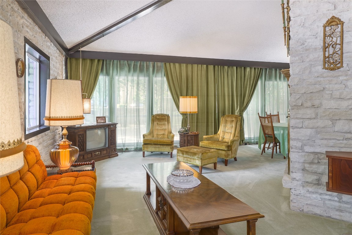 1818 Vance Circle Austin, TX 78701 - Photo 11 of 40 a living room with furniture and large windows