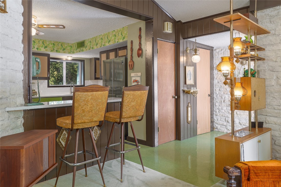 1818 Vance Circle Austin, TX 78701 - Photo 18 of 40 a view of a dining room with furniture window and outside view