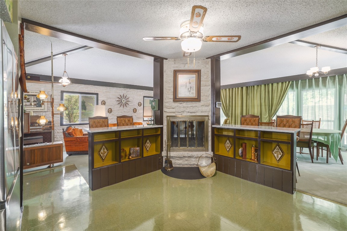 1818 Vance Circle Austin, TX 78701 - Photo 22 of 40 a living room with furniture and a fireplace
