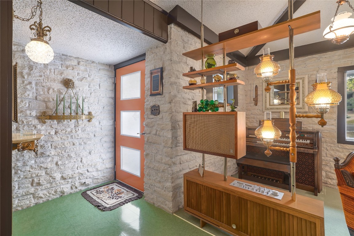 1818 Vance Circle Austin, TX 78701 - Photo 7 of 40 a bathroom with a toilet sink and mirror