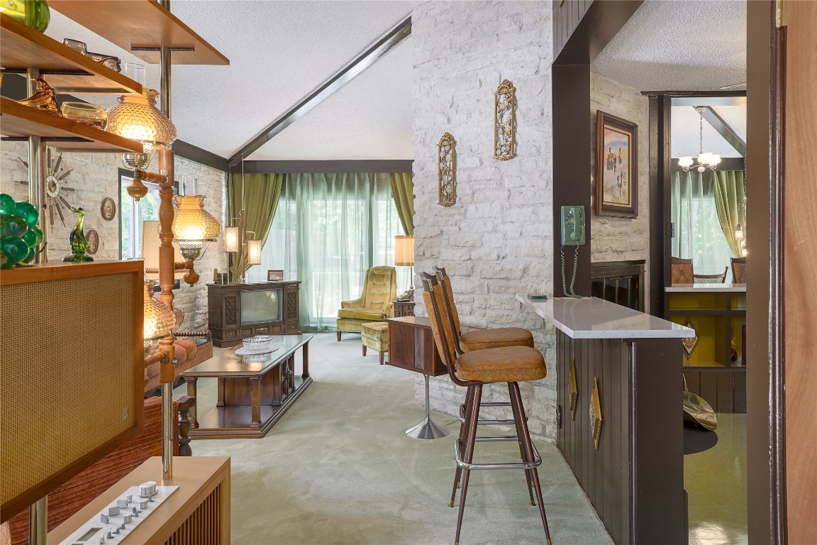 1818 Vance Circle Austin, TX 78701 - Photo 8 of 40 a building outdoor space with patio furniture and potted plants