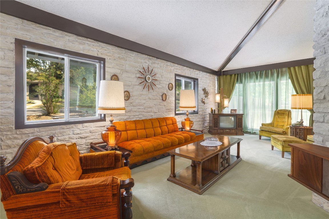 1818 Vance Circle Austin, TX 78701 - Photo 9 of 40 a living room with furniture and a large window