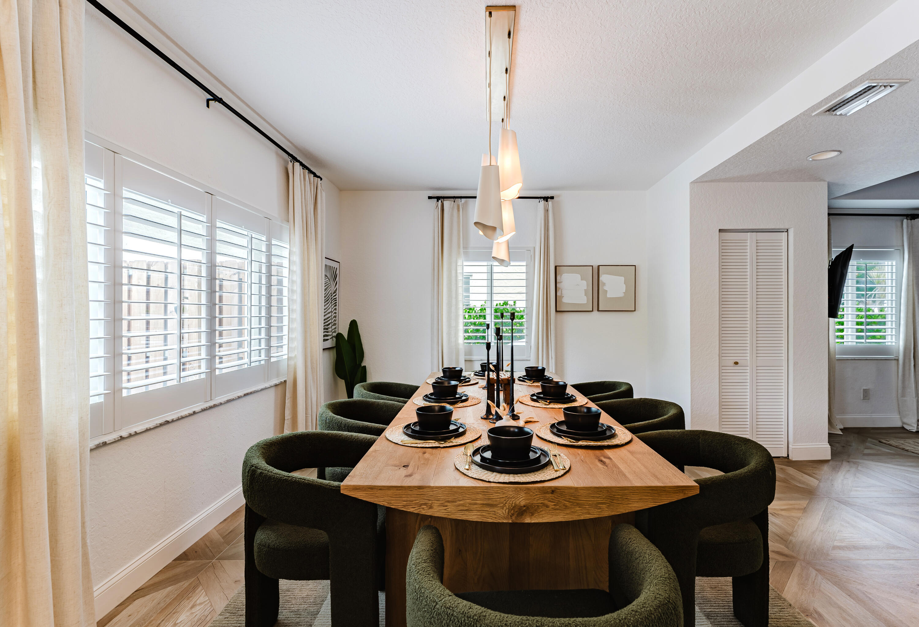 921 Ortega Road West Palm Beach, FL 33405 - Photo 10 of 60 a view of a dining room with furniture window and wooden floor