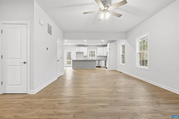 a view of an empty room with a window