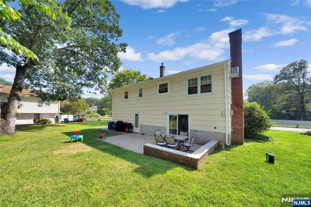 a house view with a garden space