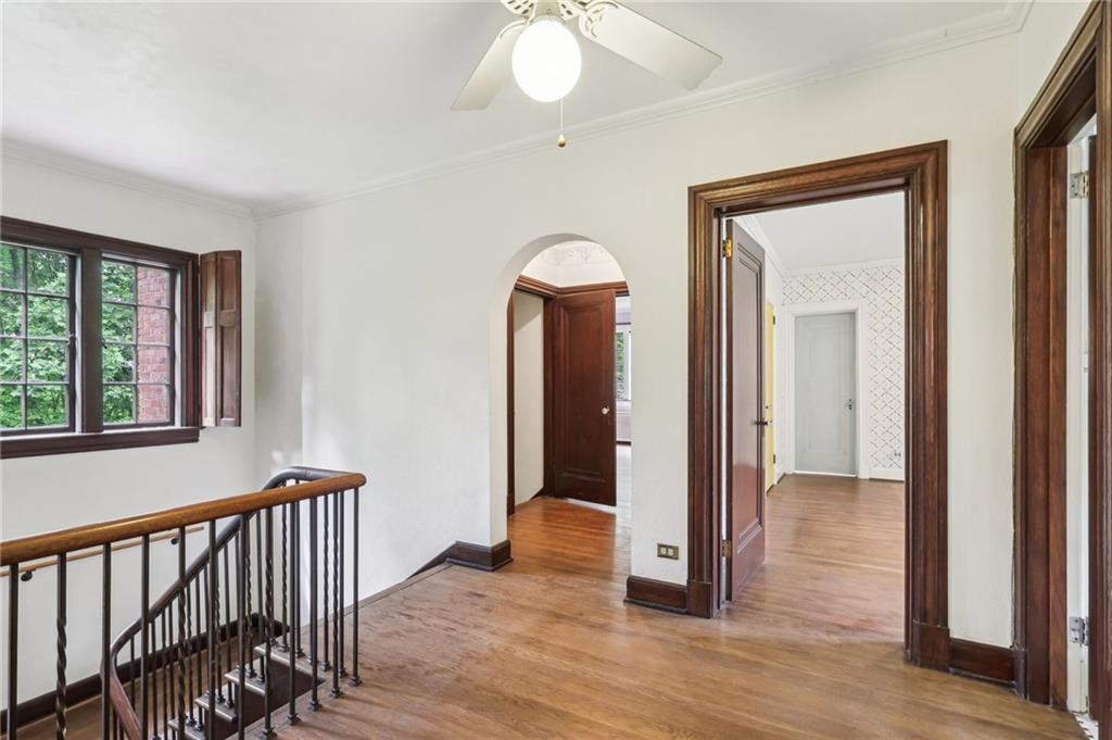 634 West Waldheim Road Pittsburgh, PA 15215 - Photo 22 of 50 a view of a hallway with wooden floor and staircase